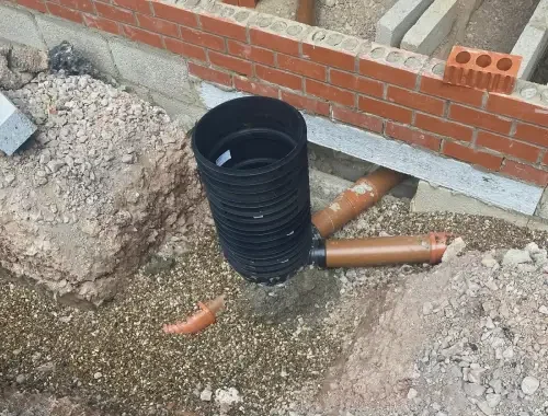 Drainage installation and groundwork construction for foul and surface water systems in London.